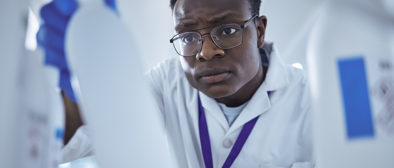 Scientist selecting proper water for reagent preparation