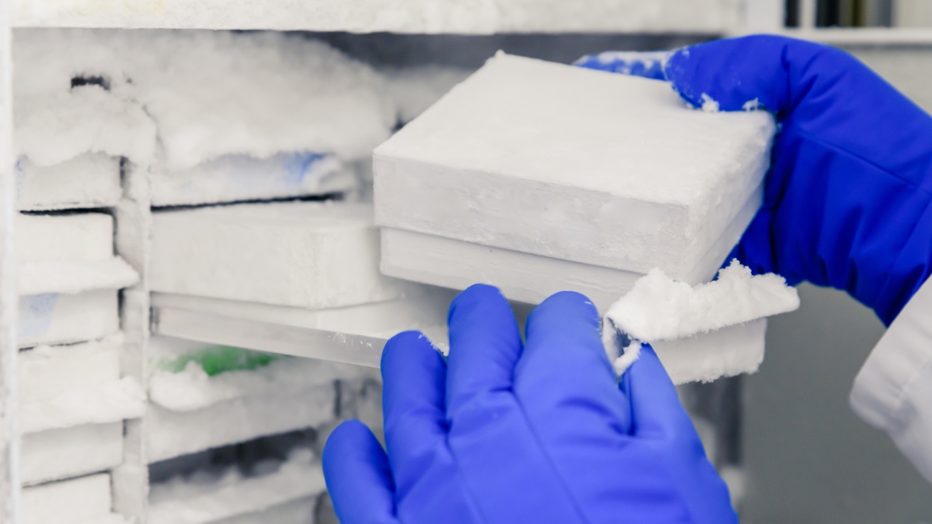 Researcher removing samples from ULT storage